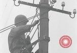 Image of US soldier climbing Delitzsch Saxony Germany, 1945, second 39 stock footage video 65675080838