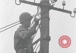 Image of US soldier climbing Delitzsch Saxony Germany, 1945, second 40 stock footage video 65675080838