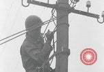Image of US soldier climbing Delitzsch Saxony Germany, 1945, second 41 stock footage video 65675080838