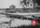Image of German forces cross temporary bridges Poland, 1939, second 1 stock footage video 65675080850