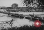 Image of German forces cross temporary bridges Poland, 1939, second 5 stock footage video 65675080850