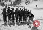 Image of US Army Parachutists skiing Alta Utah USA, 1942, second 33 stock footage video 65675080873