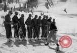 Image of US Army Parachutists skiing Alta Utah USA, 1942, second 36 stock footage video 65675080873