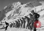 Image of US Army Parachutists skiing Alta Utah USA, 1942, second 57 stock footage video 65675080873