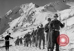 Image of US Army Parachutists skiing Alta Utah USA, 1942, second 60 stock footage video 65675080873