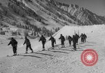 Image of US Army Parachutists skiing Alta Utah USA, 1942, second 62 stock footage video 65675080873