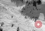 Image of US Army parachutists skiing Alta Utah USA, 1942, second 6 stock footage video 65675080877