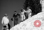 Image of US Army parachutists skiing Alta Utah USA, 1942, second 10 stock footage video 65675080877
