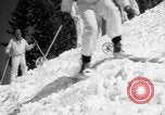 Image of US Army parachutists skiing Alta Utah USA, 1942, second 13 stock footage video 65675080877