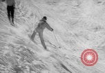 Image of US Army parachutists skiing Alta Utah USA, 1942, second 15 stock footage video 65675080877