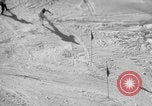 Image of US Army parachutists skiing Alta Utah USA, 1942, second 18 stock footage video 65675080877