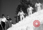 Image of US Army parachutists skiing Alta Utah USA, 1942, second 27 stock footage video 65675080877