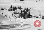 Image of US Army parachutists skiing Alta Utah USA, 1942, second 28 stock footage video 65675080877