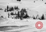 Image of US Army parachutists skiing Alta Utah USA, 1942, second 30 stock footage video 65675080877