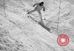 Image of US Army parachutists skiing Alta Utah USA, 1942, second 33 stock footage video 65675080877