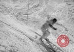 Image of US Army parachutists skiing Alta Utah USA, 1942, second 34 stock footage video 65675080877