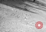 Image of US Army parachutists skiing Alta Utah USA, 1942, second 45 stock footage video 65675080877