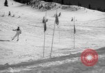 Image of US Army parachutists skiing Alta Utah USA, 1942, second 49 stock footage video 65675080877