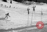 Image of US Army parachutists skiing Alta Utah USA, 1942, second 50 stock footage video 65675080877