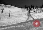 Image of US Army parachutists skiing Alta Utah USA, 1942, second 52 stock footage video 65675080877