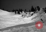 Image of US Army parachutists skiing Alta Utah USA, 1942, second 53 stock footage video 65675080877
