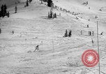 Image of US Army parachutists skiing Alta Utah USA, 1942, second 61 stock footage video 65675080877
