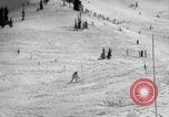 Image of US Army parachutists skiing Alta Utah USA, 1942, second 62 stock footage video 65675080877