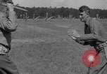 Image of practicing disarming opponent with knife United States USA, 1938, second 16 stock footage video 65675080899