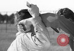 Image of practicing disarming opponent with knife United States USA, 1938, second 19 stock footage video 65675080899