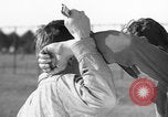 Image of practicing disarming opponent with knife United States USA, 1938, second 20 stock footage video 65675080899