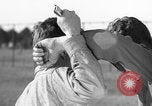 Image of practicing disarming opponent with knife United States USA, 1938, second 21 stock footage video 65675080899