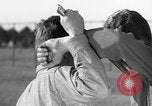 Image of practicing disarming opponent with knife United States USA, 1938, second 23 stock footage video 65675080899