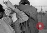 Image of practicing disarming opponent with knife United States USA, 1938, second 29 stock footage video 65675080899