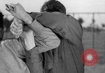 Image of practicing disarming opponent with knife United States USA, 1938, second 31 stock footage video 65675080899