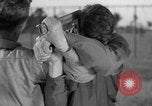 Image of practicing disarming opponent with knife United States USA, 1938, second 32 stock footage video 65675080899
