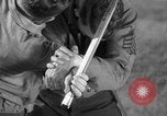 Image of practicing disarming opponent with knife United States USA, 1938, second 34 stock footage video 65675080899