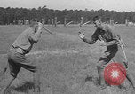 Image of practicing disarming opponent with knife United States USA, 1938, second 37 stock footage video 65675080899
