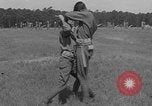 Image of practicing disarming opponent with knife United States USA, 1938, second 39 stock footage video 65675080899