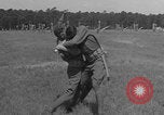 Image of practicing disarming opponent with knife United States USA, 1938, second 43 stock footage video 65675080899