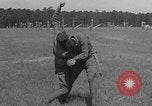 Image of practicing disarming opponent with knife United States USA, 1938, second 45 stock footage video 65675080899