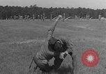 Image of practicing disarming opponent with knife United States USA, 1938, second 46 stock footage video 65675080899