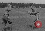 Image of practicing disarming opponent with knife United States USA, 1938, second 49 stock footage video 65675080899
