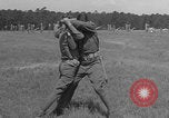 Image of practicing disarming opponent with knife United States USA, 1938, second 53 stock footage video 65675080899
