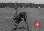 Image of practicing disarming opponent with knife United States USA, 1938, second 58 stock footage video 65675080899