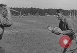 Image of practicing disarming opponent with knife United States USA, 1938, second 60 stock footage video 65675080899