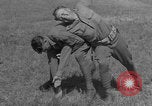 Image of disarming against underhand knife attack United States USA, 1938, second 36 stock footage video 65675080900