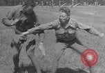 Image of disarming against underhand knife attack United States USA, 1938, second 46 stock footage video 65675080900