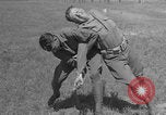 Image of disarming against underhand knife attack United States USA, 1938, second 51 stock footage video 65675080900