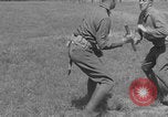 Image of disarming against underhand knife attack United States USA, 1938, second 53 stock footage video 65675080900