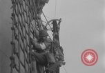 Image of US troops land on Normandy coast Normandy France, 1944, second 39 stock footage video 65675080937